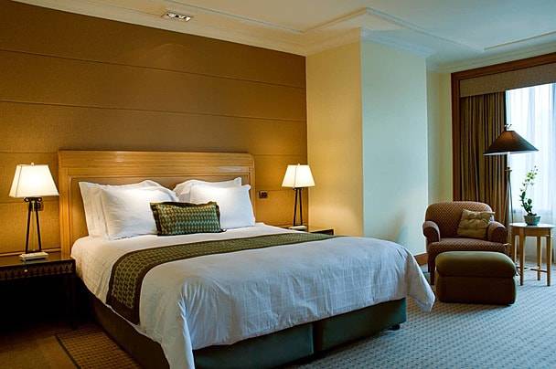 A luxury hotel suite prepared for in-room spa therapy A luxury hotel suite prepared for in-room spa therapy
