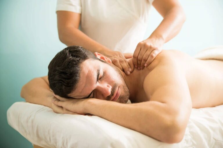 A guest relaxing during a gentle Swedish massage
