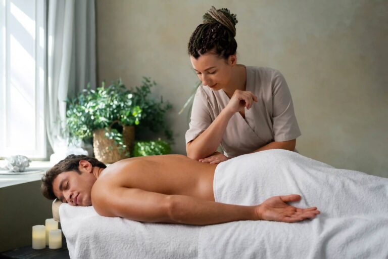 Therapist giving a Russian body massage Therapist giving a Russian body massage